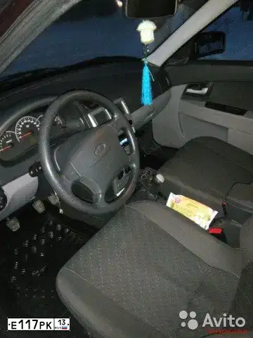 Фото автомобиля LADA 2172 PRIORA, 2011 — госномер Е117РК13. Цвет: ТЕМНО-ВИШНЕВЫЙ