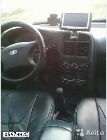 Фото автомобиля LADA 2112 LADA, 2006 — госномер У388РА150. Цвет: Темно-зеленый