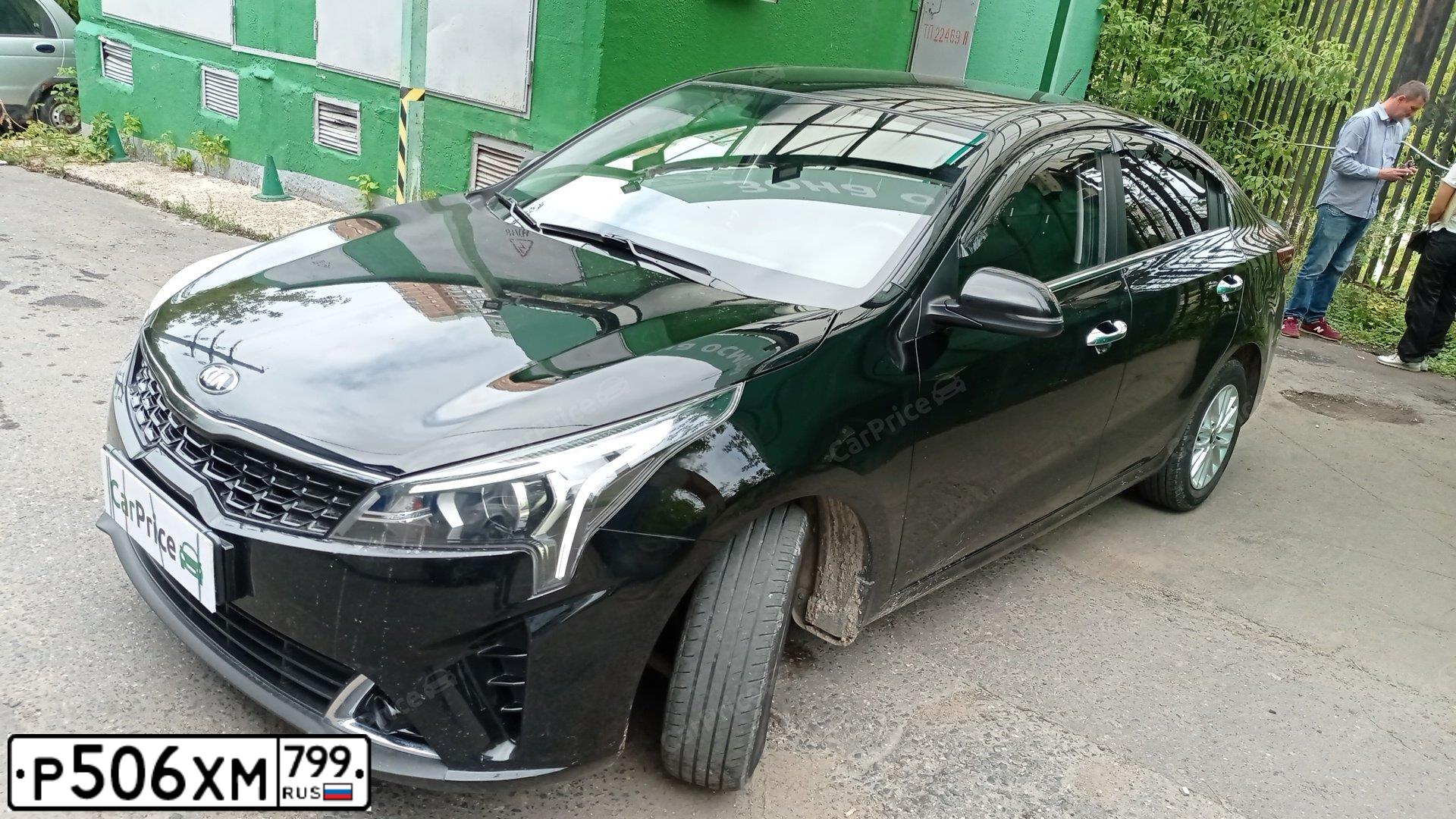 Фото автомобиля KIA RIO, 2021 — госномер Т114УО33. Цвет: ЧЕРНЫЙ
