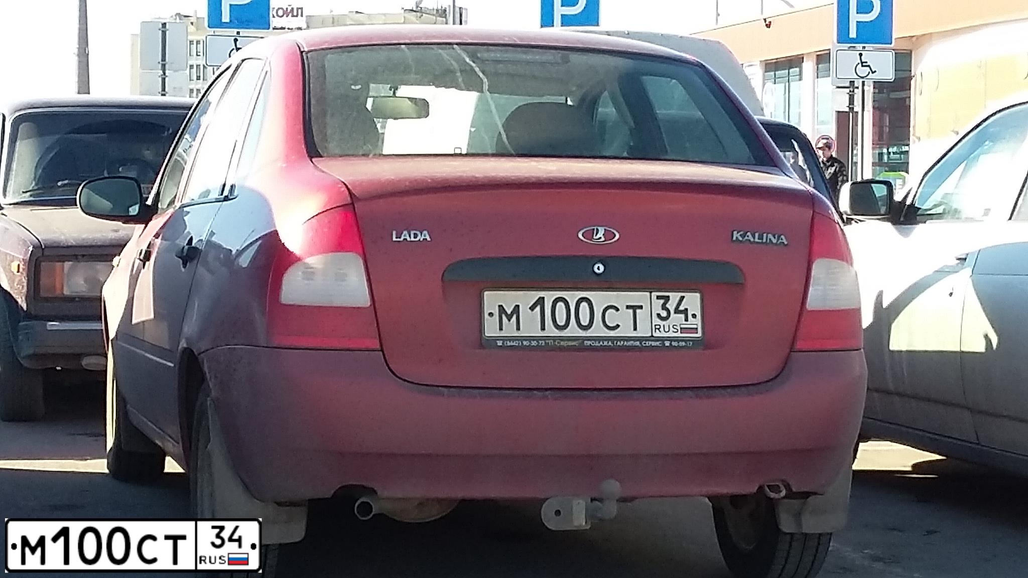 Фото автомобиля LADA 1118 KALINA, 2008 — госномер М100СТ34. Цвет: СЕРЕБРИСТЫЙ КРАСНЫЙ