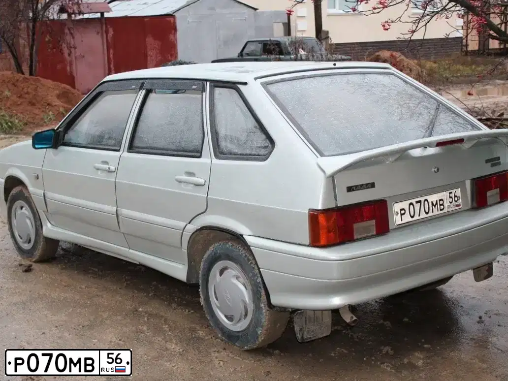 Фото автомобиля LADA 2114 SAMARA, 2004 — госномер Р070МВ56. Цвет: МОЛОЧНО-БЕЛЫЙ СЕРЕБРИСТЫЙ