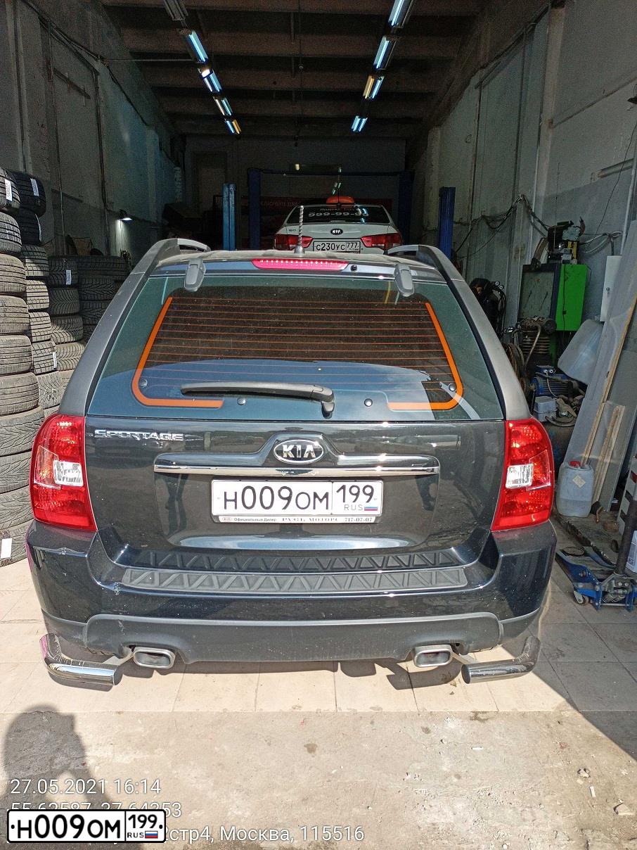 Фото автомобиля KIA SPORTAGE, 2009 — госномер Н009ОМ199. Цвет: ЧЕРНЫЙ