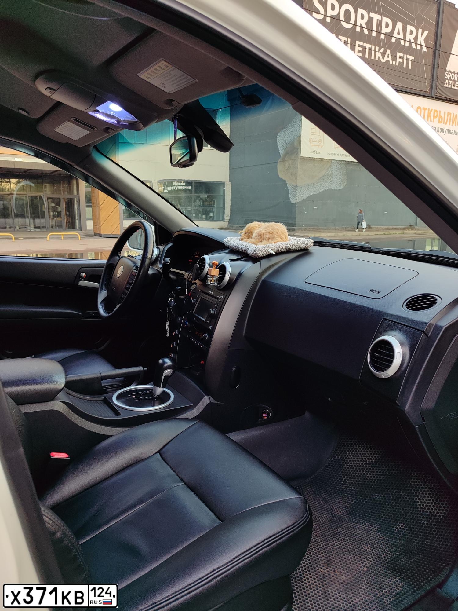 Фото автомобиля SSANGYONG ACTYON SPORTS, 2009 — госномер Х371КВ124. Цвет: Белый