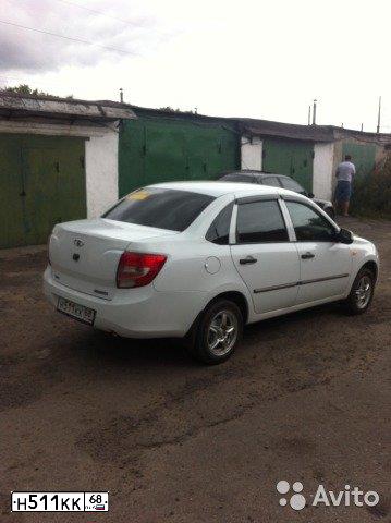 Фото автомобиля LADA 2190 GRANTA, 2013 — госномер Е252НВ68. Цвет: БЕЛЫЙ