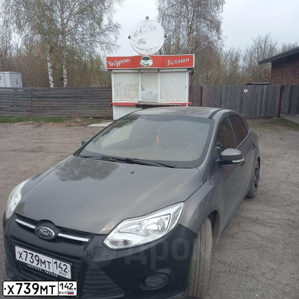 Фото автомобиля FORD FOCUS, 2012 — госномер Р716НР70