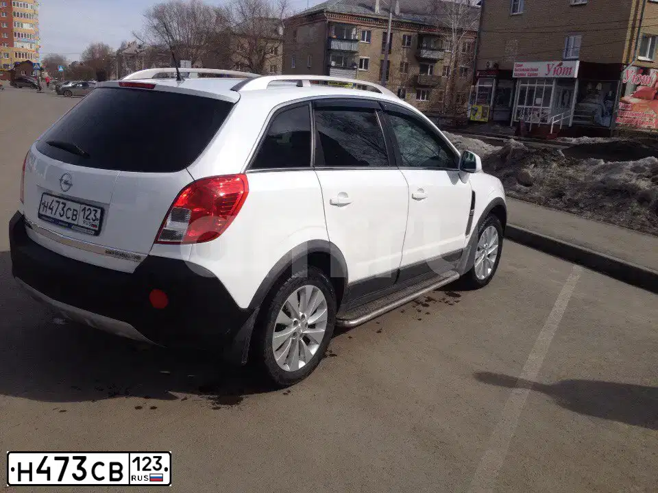 Фото автомобиля OPEL ANTARA, 2013 — госномер О323ХС174. Цвет: Белый