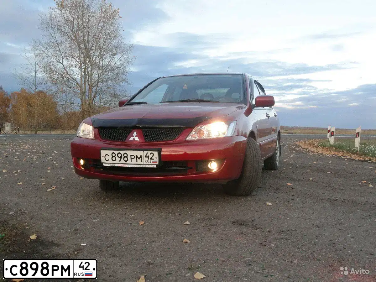 Фото автомобиля MITSUBISHI LANCER, 2006 — госномер Р826ВМ193. Цвет: Красный