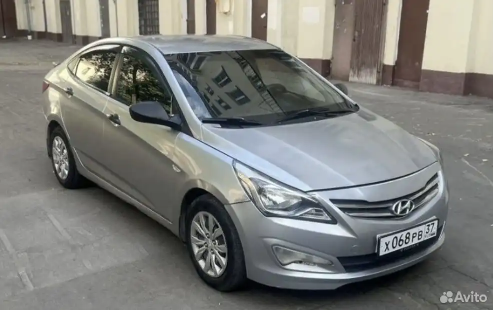 Фото автомобиля HYUNDAI SOLARIS, 2015 — госномер Х068РВ37. Цвет: ЖЕЛТЫЙ
