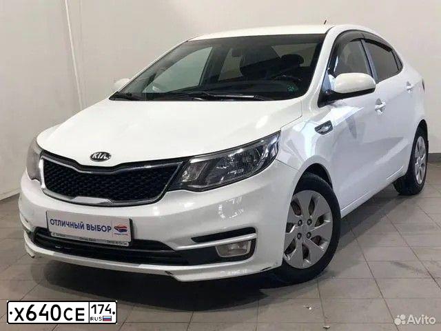 Фото автомобиля KIA RIO, 2015 — госномер К902ОХ702. Цвет: Белый
