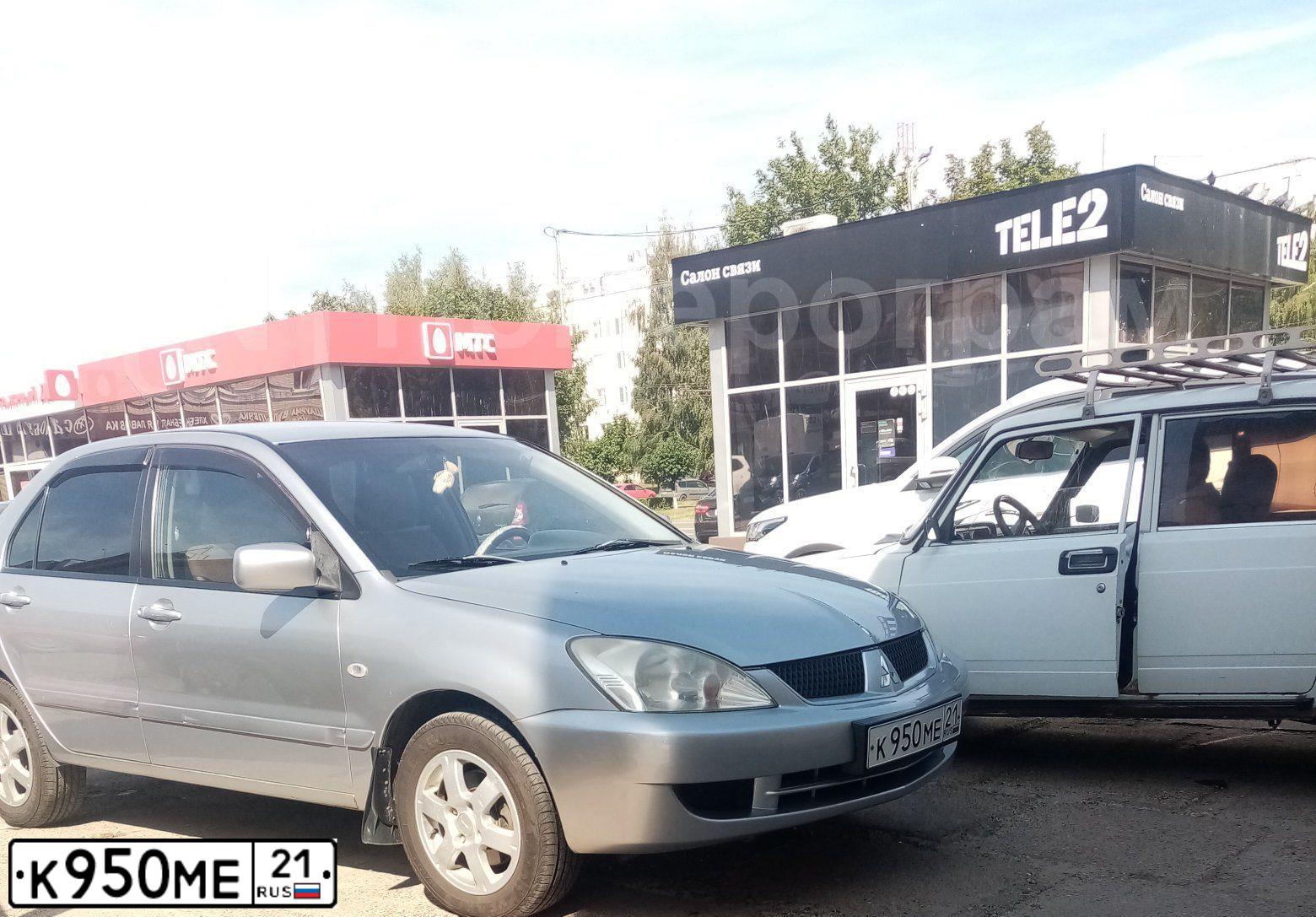 Фото автомобиля VOLKSWAGEN TOUAREG, 2005 — госномер Е149ТЕ57. Цвет: ЧЕРНЫЙ