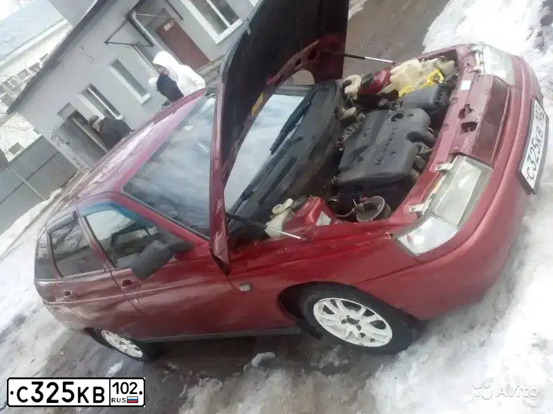Фото автомобиля LADA 2112, 2004 — госномер С325КВ102. Цвет: КРАСНО-ОРАНЖЕВЫЙ