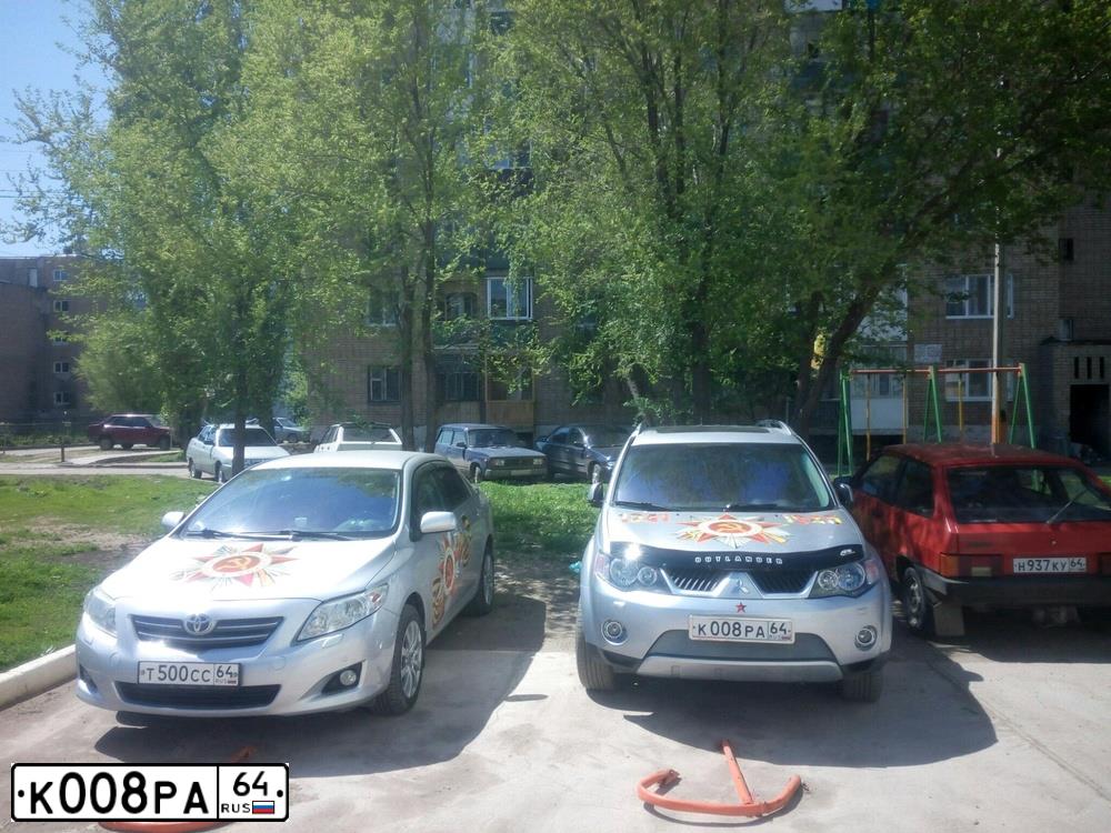 Фото автомобиля MITSUBISHI OUTLANDER, 2006 — госномер К008РА64. Цвет: ЧЕРНЫЙ