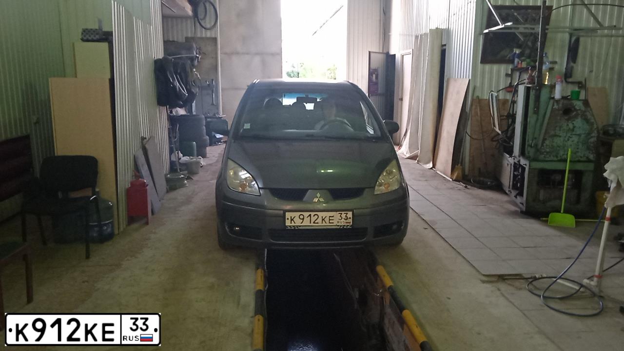 Фото автомобиля MITSUBISHI COLT, 2004 — госномер К912КЕ33. Цвет: СЕРО-ЗЕЛЕНЫЙ