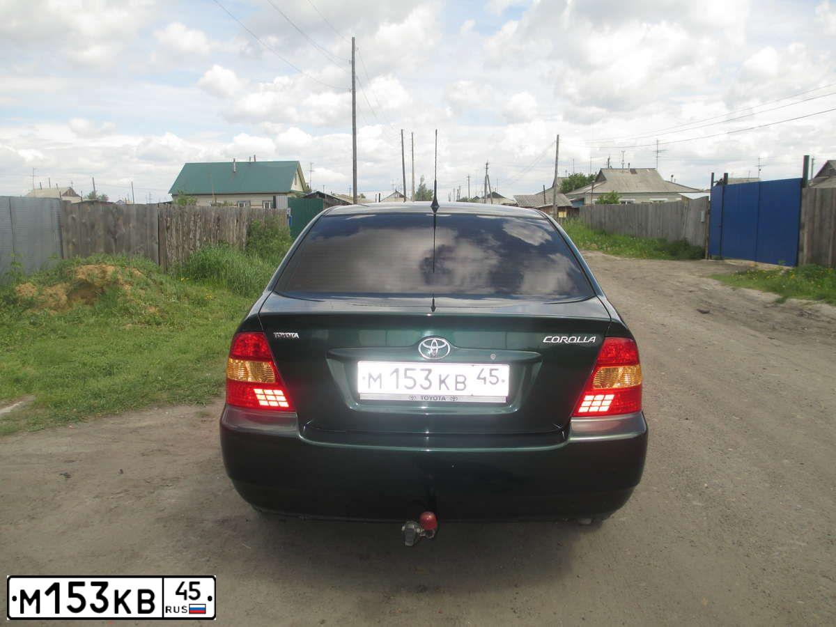 Фото автомобиля TOYOTA COROLLA, 2003 — госномер М153КВ45. Цвет: ЗЕЛЕНЫЙ