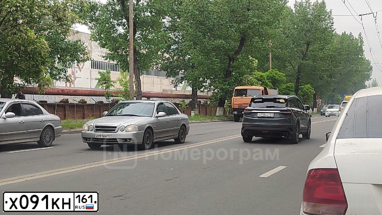 Фото автомобиля MAZDA 3, 2010 — госномер Н730ХР161. Цвет: СЕРЕБРИСТЫЙ