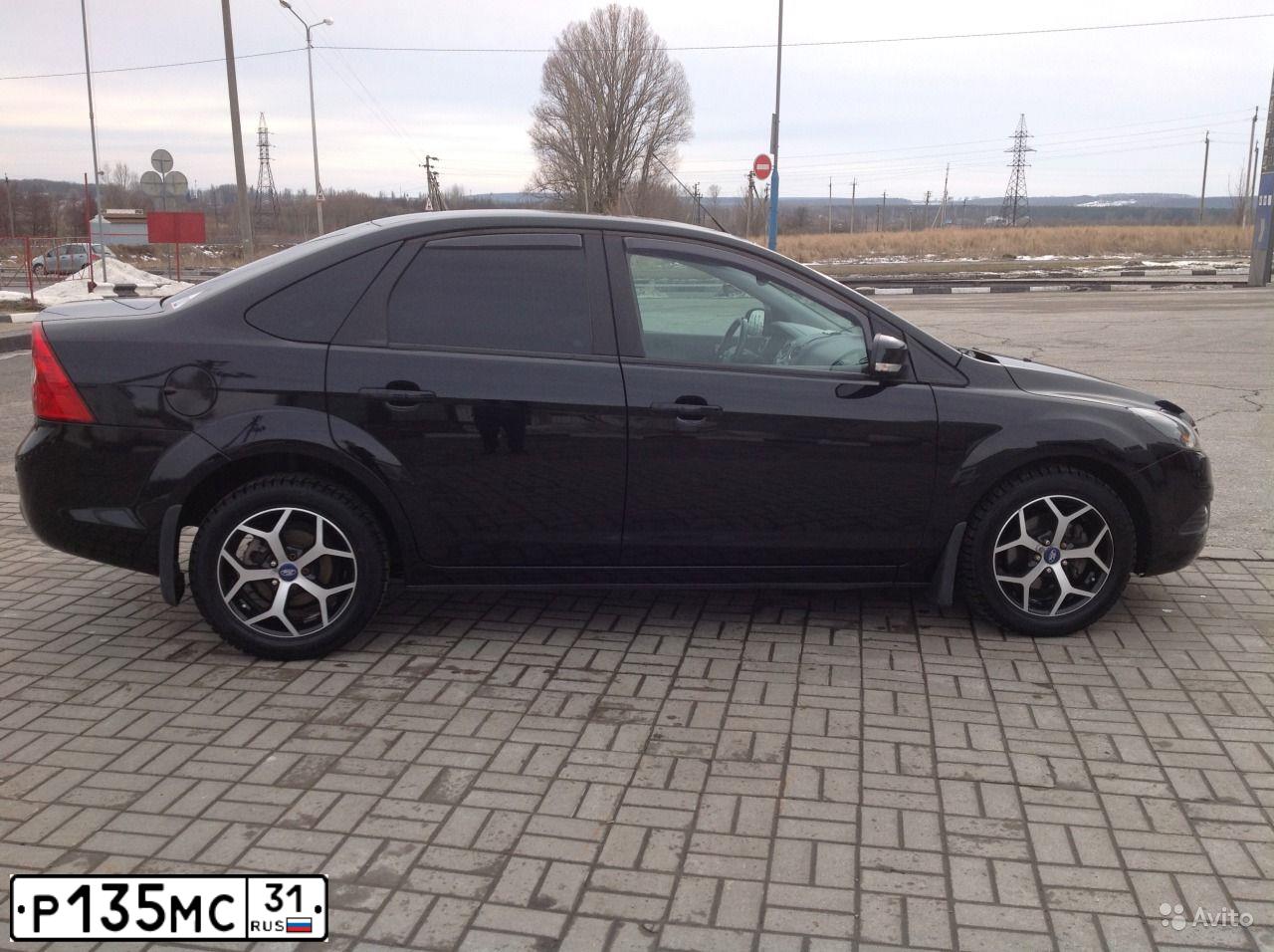 Фото автомобиля FORD FOCUS, 2008 — госномер Т941ОХ31. Цвет: ЧЕРНЫЙ