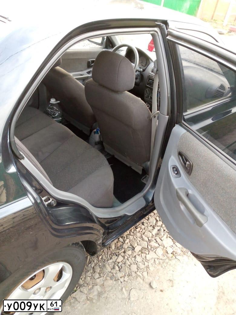 Фото автомобиля OPEL ASTRA, 2012 — госномер В197НВ761. Цвет: Белый