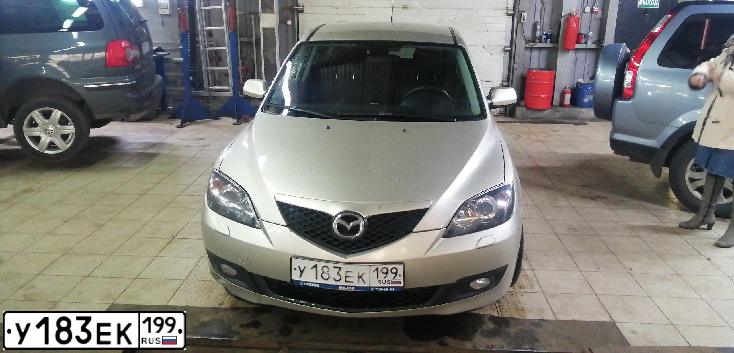 Фото автомобиля MAZDA 3, 2007 — госномер У183ЕК199. Цвет: СЕРО-ЗОЛОТИСТЫЙ