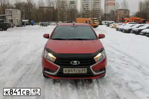 Фото автомобиля LADA VESTA, 2017 — госномер Х712ХР102. Цвет: КРАСНЫЙ