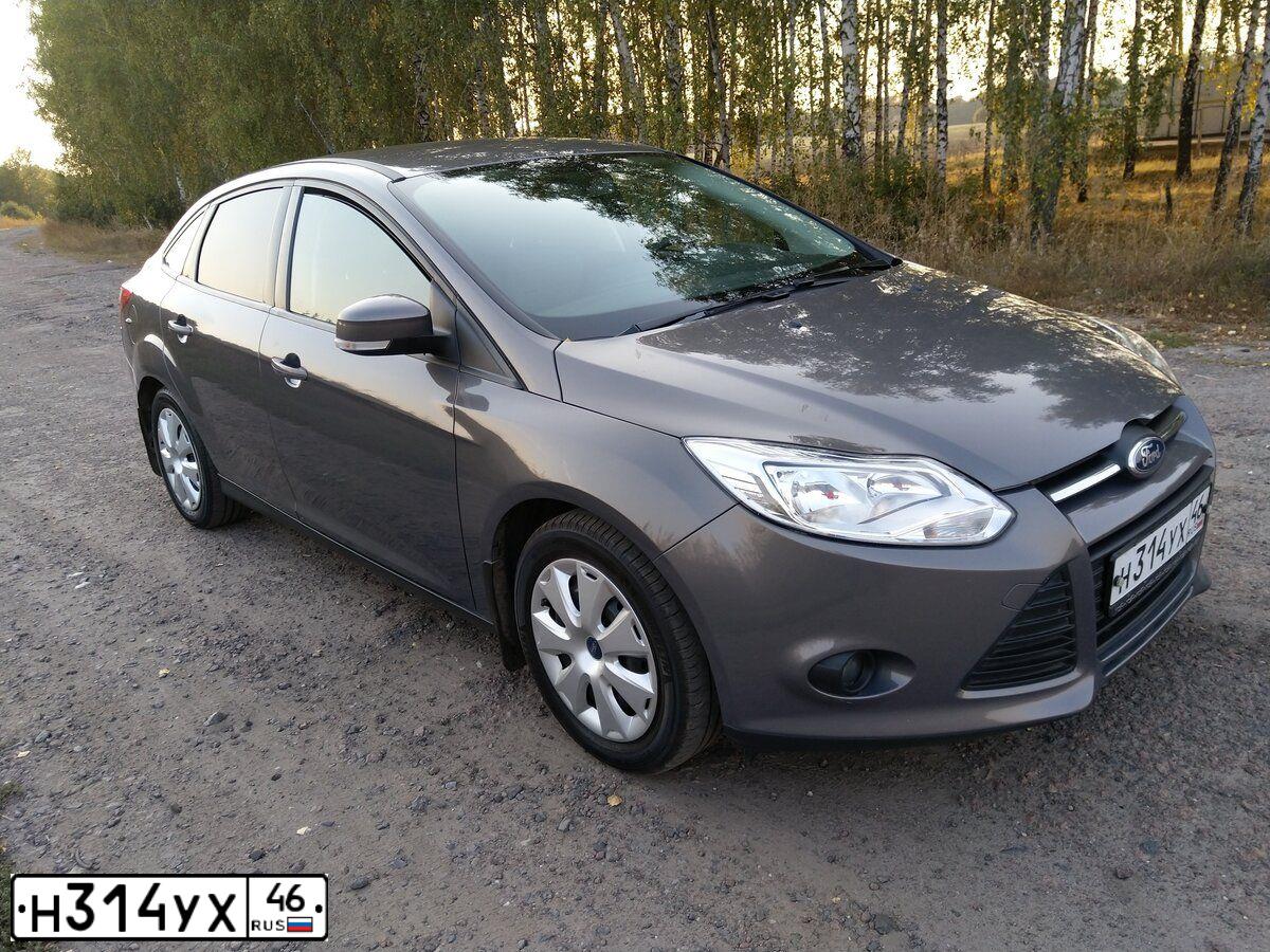 Фото автомобиля FORD FOCUS, 2013 — госномер О533ВО46. Цвет: СЕРО-КОРИЧНЕВЫЙ