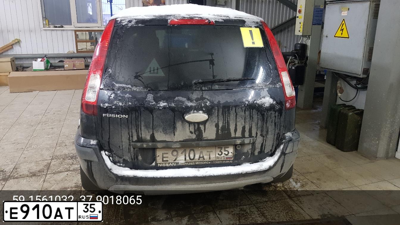 Фото автомобиля FORD FUSION, 2008 — госномер Е910АТ35. Цвет: ЧЕРНЫЙ