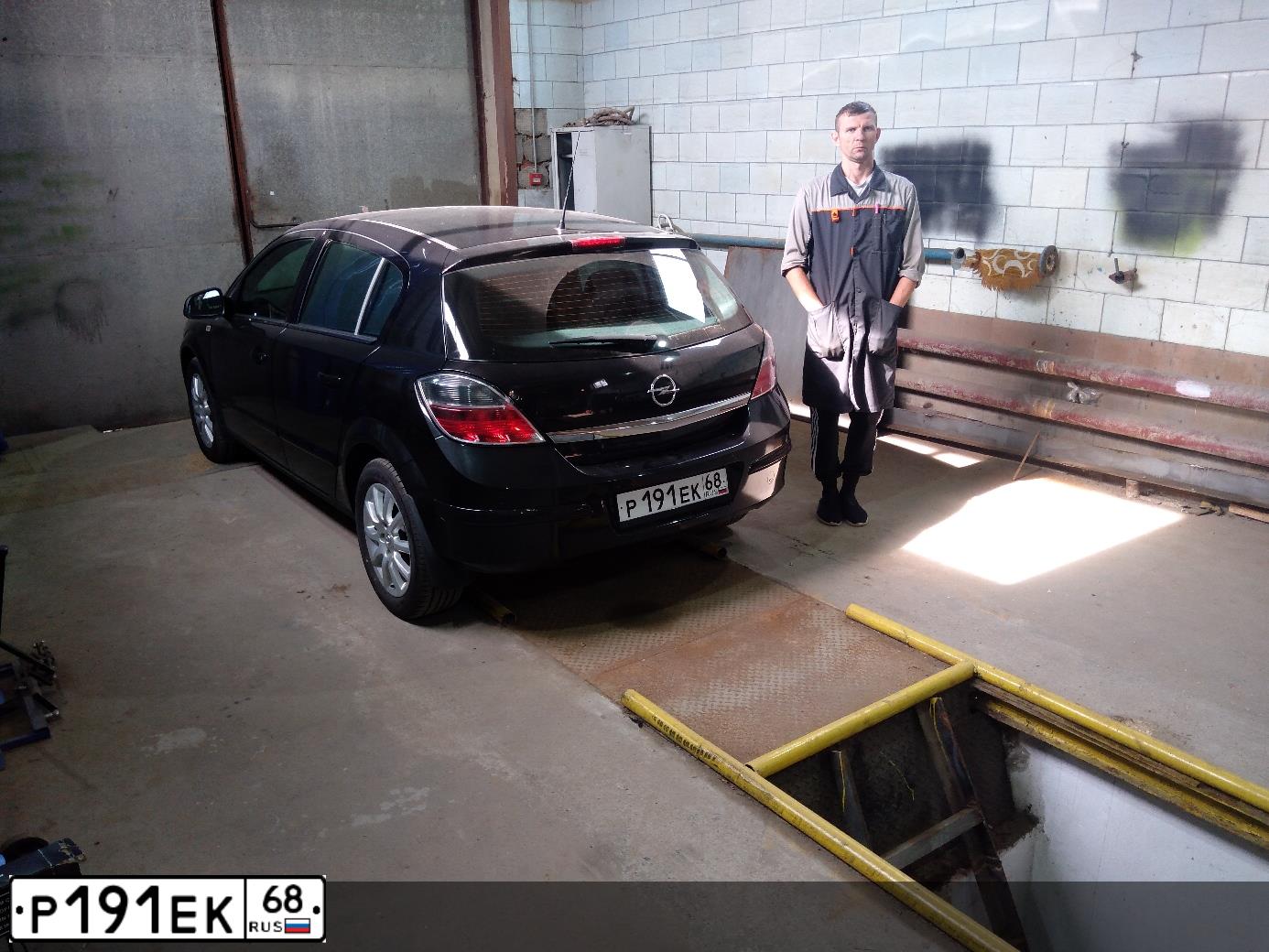 Фото автомобиля OPEL ASTRA, 2012 — госномер А254АН250. Цвет: ЧЕРНЫЙ