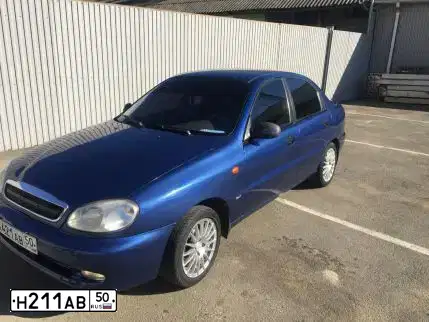 Фото автомобиля HYUNDAI SOLARIS, 2013 — госномер Н211АВ50. Цвет: ЧЕРНЫЙ