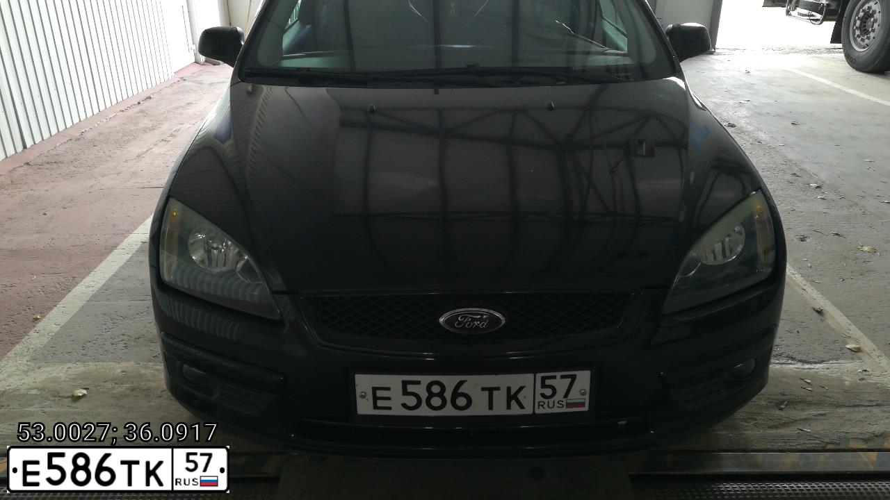 Фото автомобиля FORD FOCUS, 2007 — госномер Е586ТК57. Цвет: ЧЕРНЫЙ
