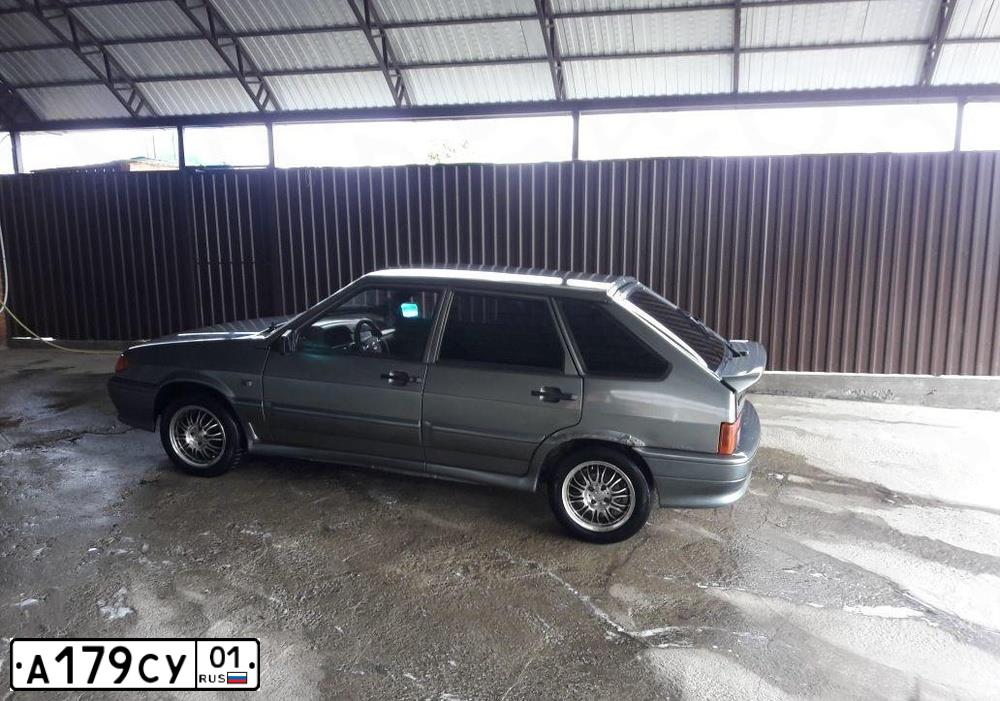 Фото автомобиля LADA 2114 SAMARA, 2007 — госномер А179СУ01. Цвет: СРЕДНИЙ СЕРО-ЗЕЛЕНЫЙ МЕТ.