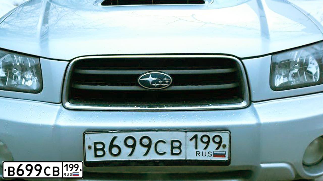 Фото автомобиля SUBARU FORESTER, 2004 — госномер О347МН29. Цвет: СЕРЕБРИСТЫЙ