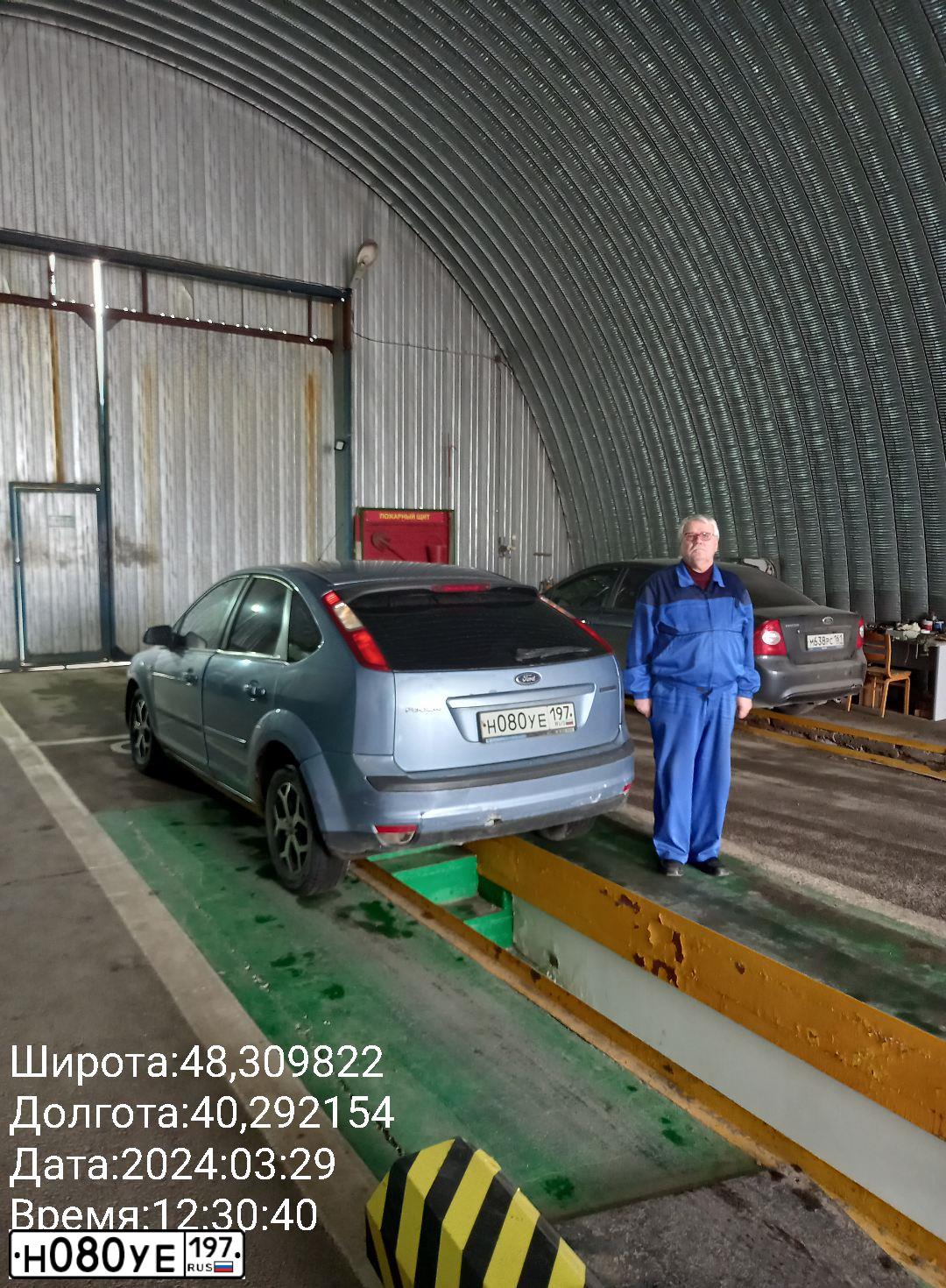 Фото автомобиля FORD FOCUS, 2006 — госномер Х909ВУ761. Цвет: Светло-Серо-Голубой