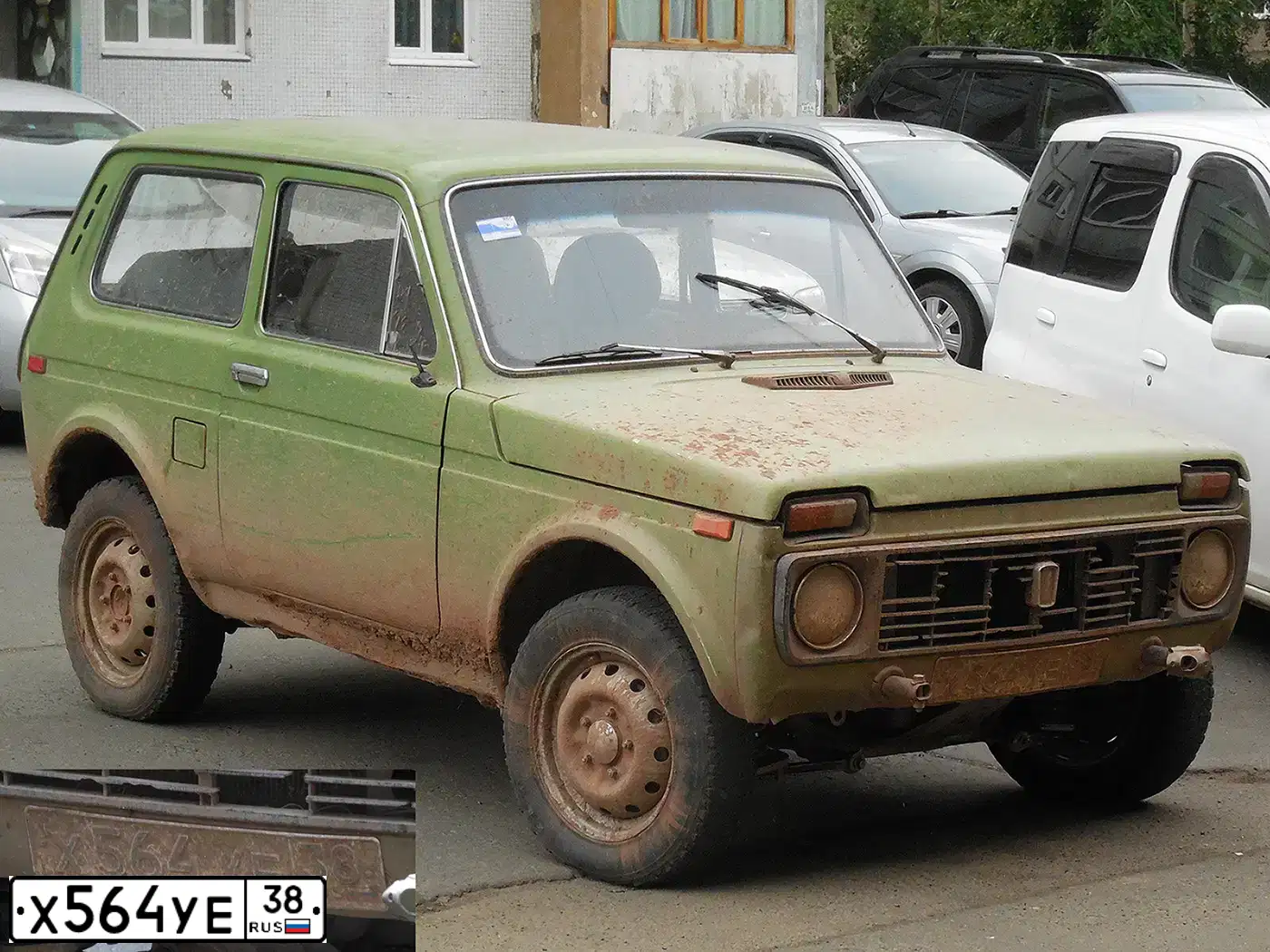Фото автомобиля LADA 2121 NIVA, 1991 — госномер Х564УЕ38. Цвет: ОЛИВКОВЫЙ