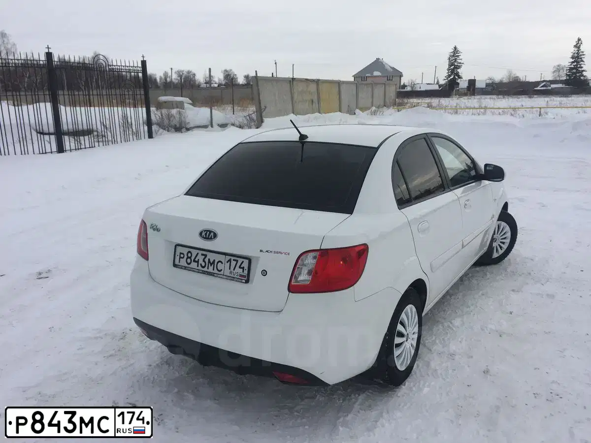 Фото автомобиля KIA RIO, 2009 — госномер К509ЕТ774. Цвет: Белый