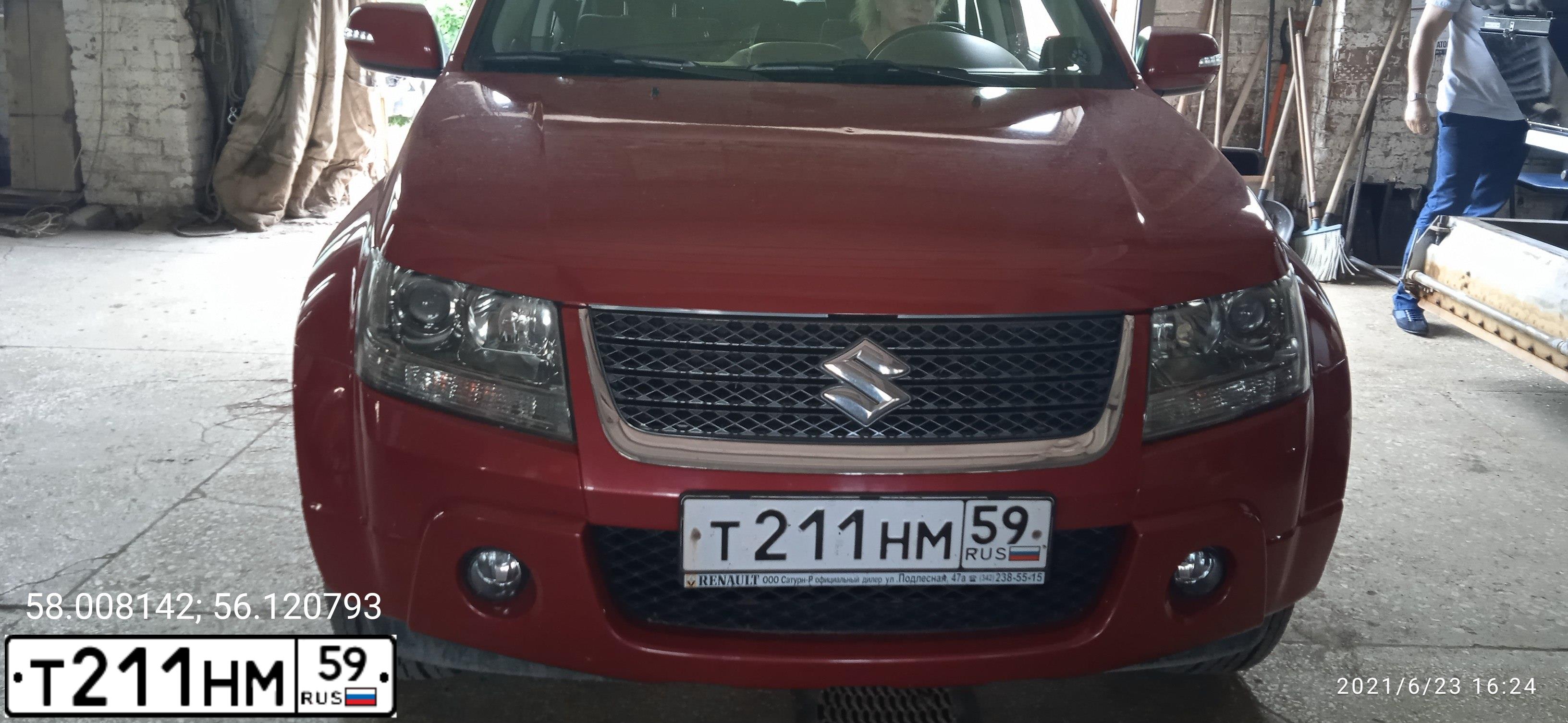 Фото автомобиля SUZUKI /GRAND/ VITARA, 2010 — госномер Т211НМ59. Цвет: КРАСНЫЙ