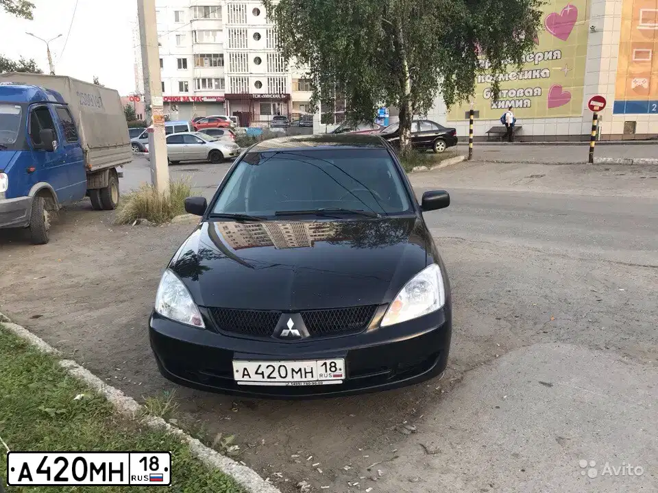 Фото автомобиля MITSUBISHI LANCER, 2006 — госномер О643ЕР159. Цвет: ЧЕРНЫЙ