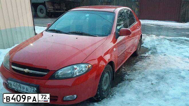 Фото автомобиля CHEVROLET LACETTI, 2005 — госномер В409РА72. Цвет: Красный