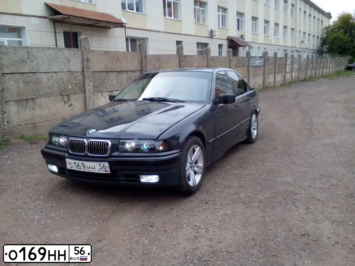 Фото автомобиля BMW SERIE 3, 1991 — госномер О169НН56. Цвет: ТЕМНО-СЕРЫЙ
