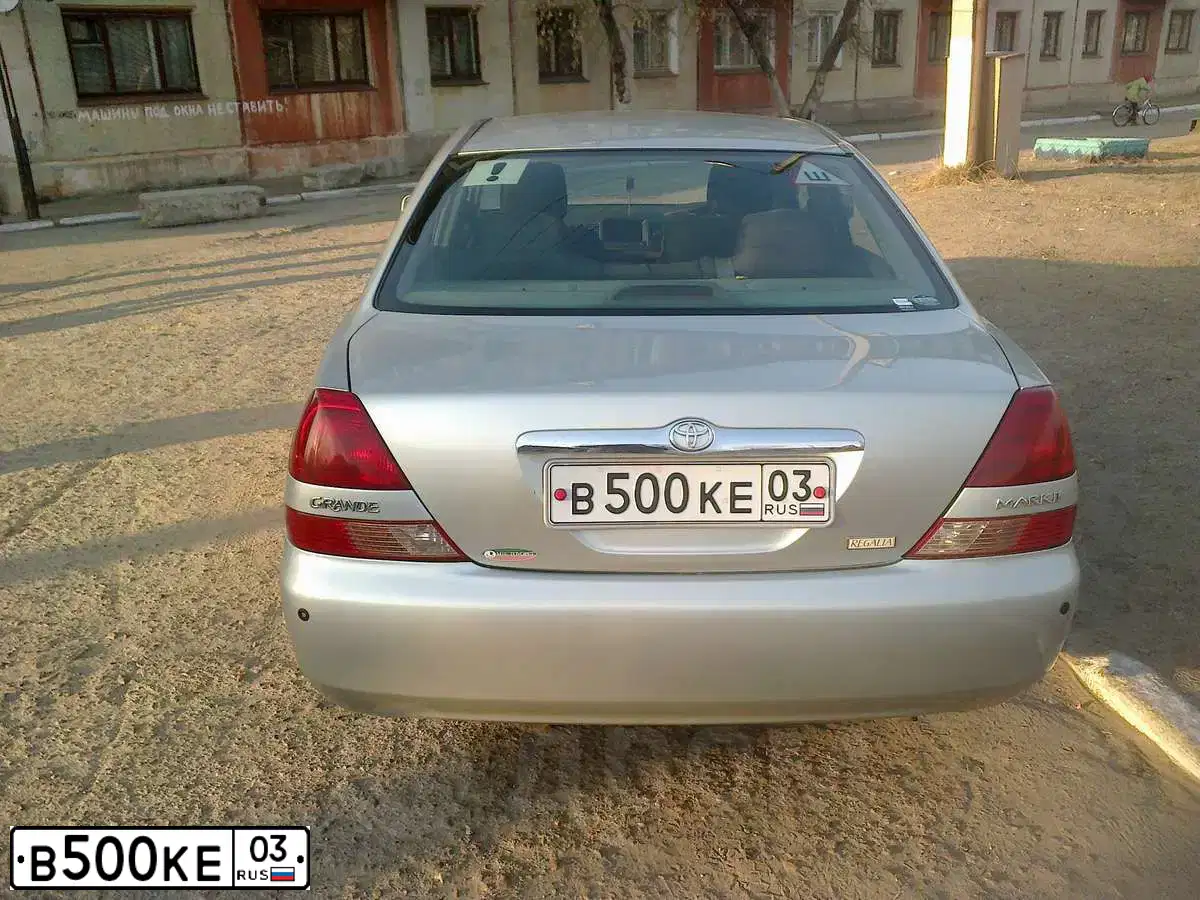 Фото автомобиля NISSAN QASHQAI, 2012 — госномер В500КЕ03. Цвет: СЕРЫЙ