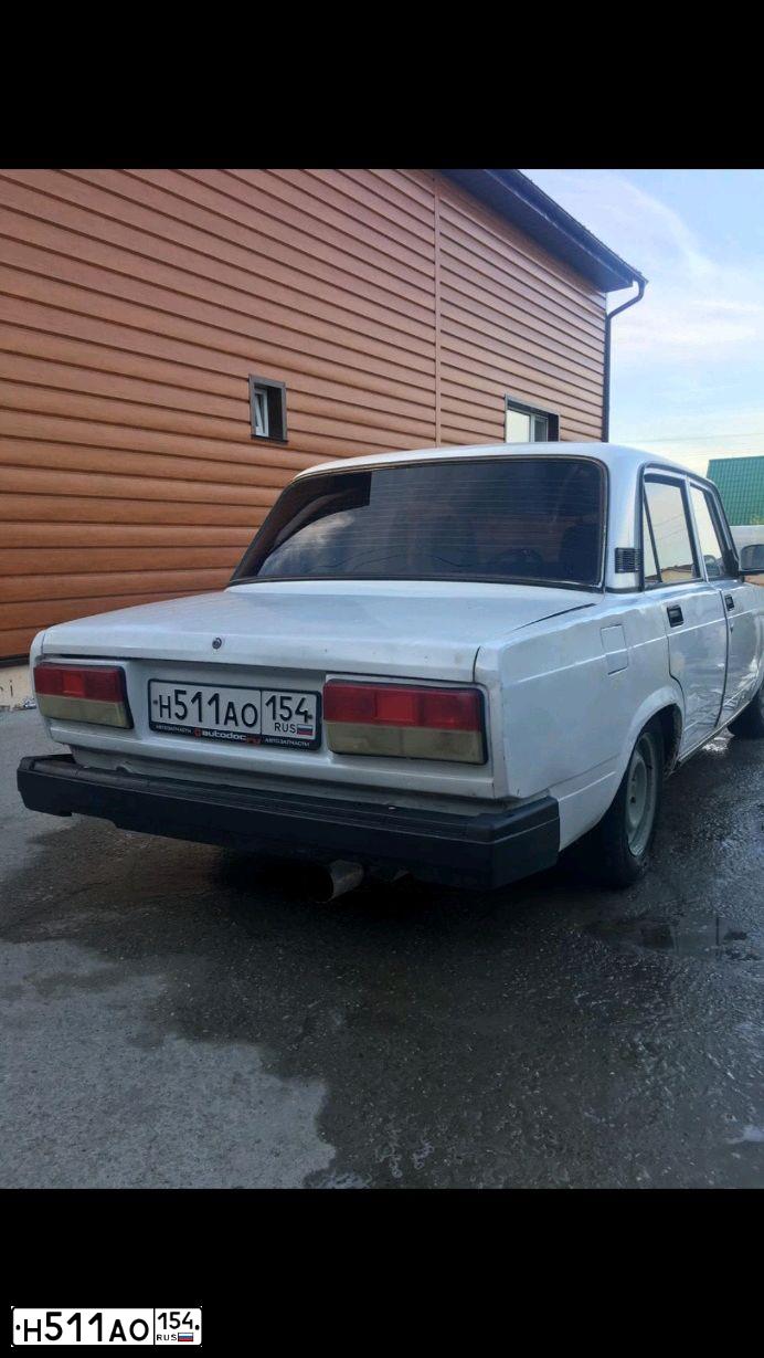 Фото автомобиля LADA 2107, 2007 — госномер Н511АО154. Цвет: ЯРКО БЕЛЫЙ