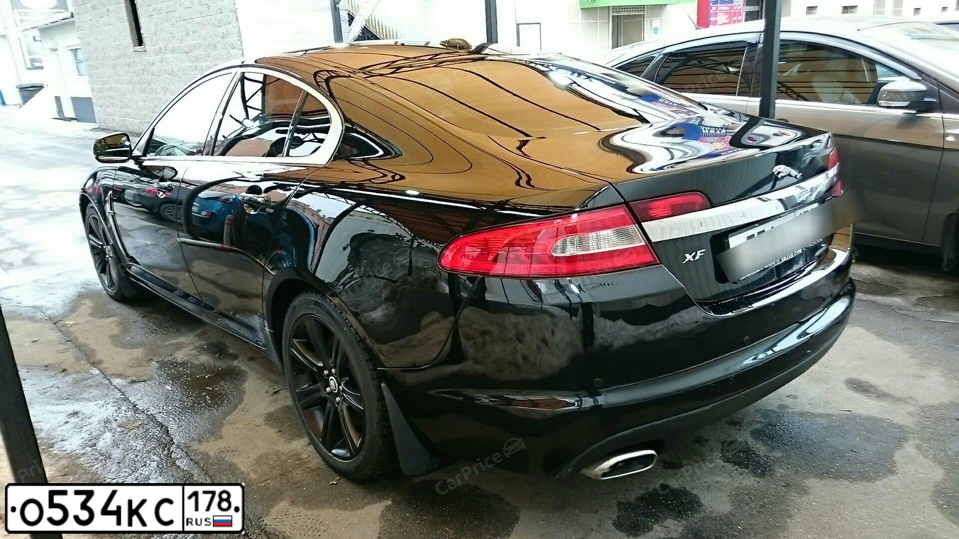 Фото автомобиля JAGUAR XF-SERIE, 2010 — госномер В197МР197. Цвет: ЧЕРНЫЙ