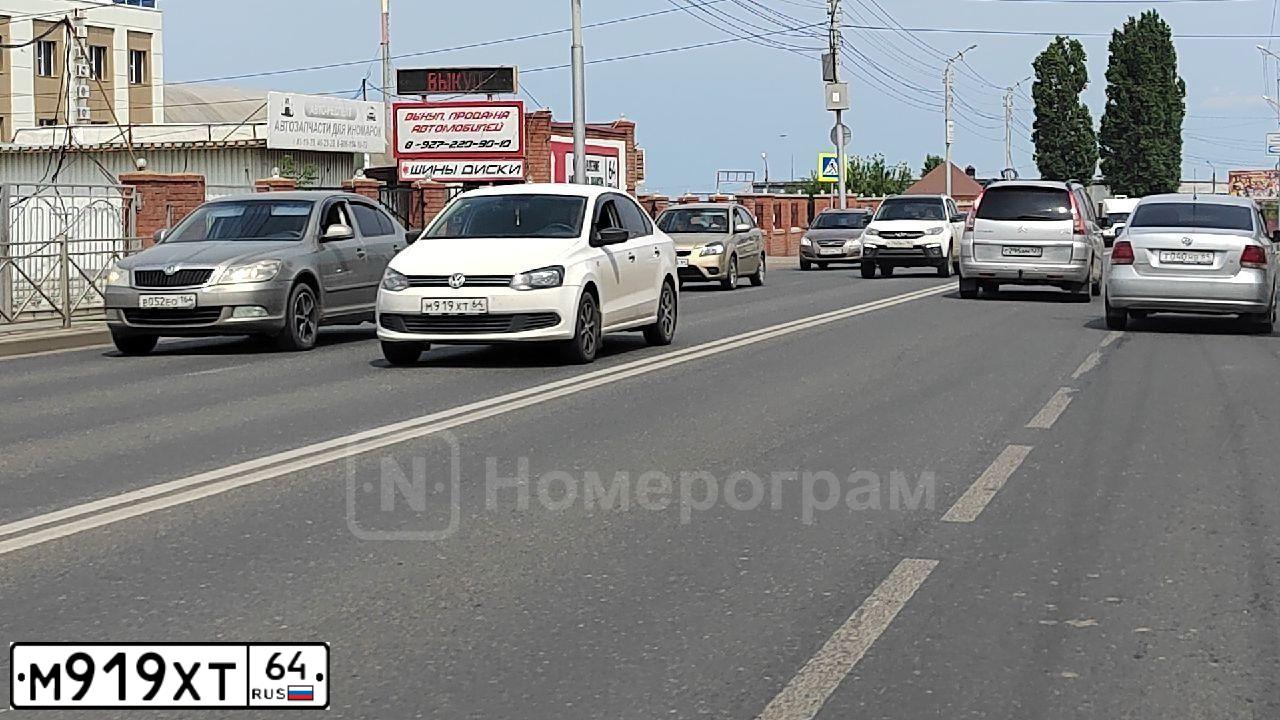 Фото автомобиля VOLKSWAGEN POLO, 2011 — госномер М919ХТ64. Цвет: БЕЛЫЙ