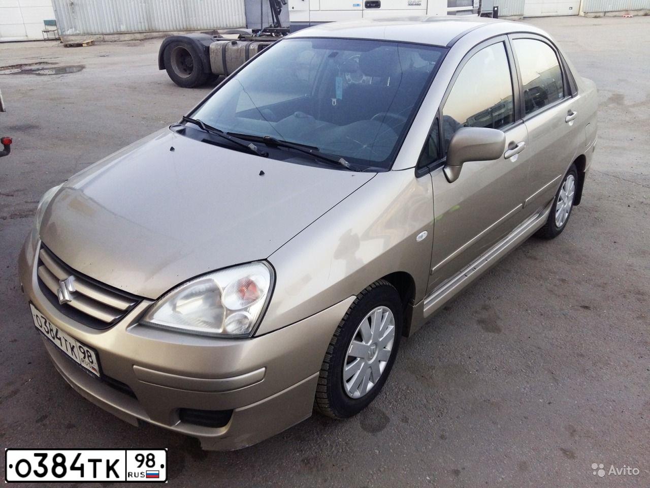 Фото автомобиля SUZUKI LIANA, 2006 — госномер О384ТК98. Цвет: БЕЖЕВЫЙ
