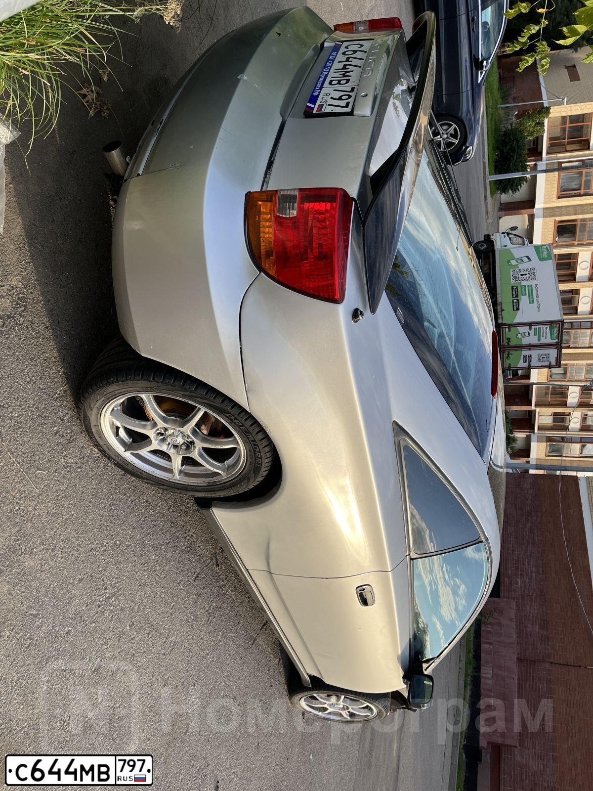 Фото автомобиля TOYOTA CELICA, 2001 — госномер Р471ЕС761. Цвет: СВЕТЛО-СЕРЫЙ