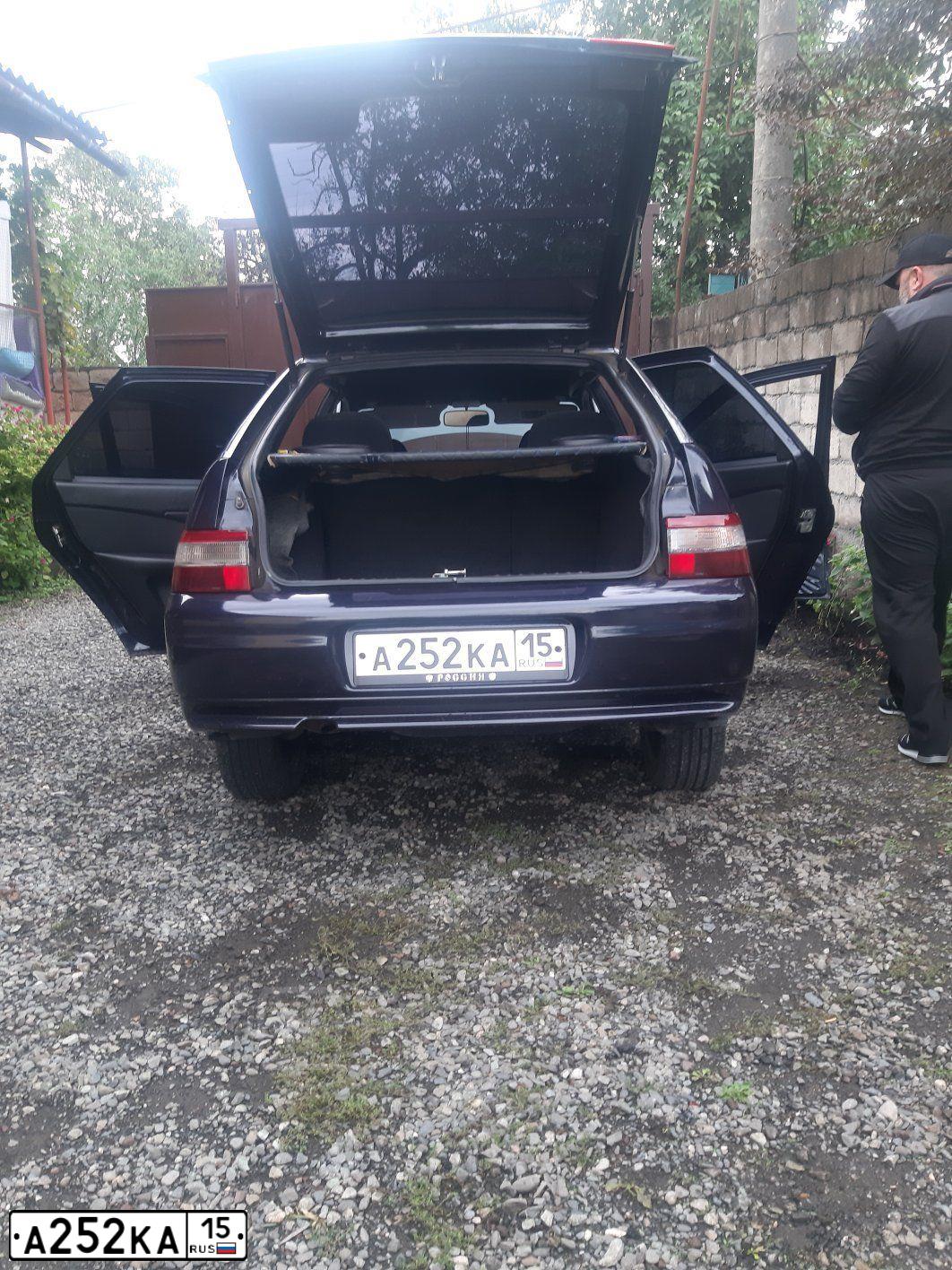 Фото автомобиля LADA 2112 LADA, 2007 — госномер А252КА15. Цвет: ЧЕРНИКА