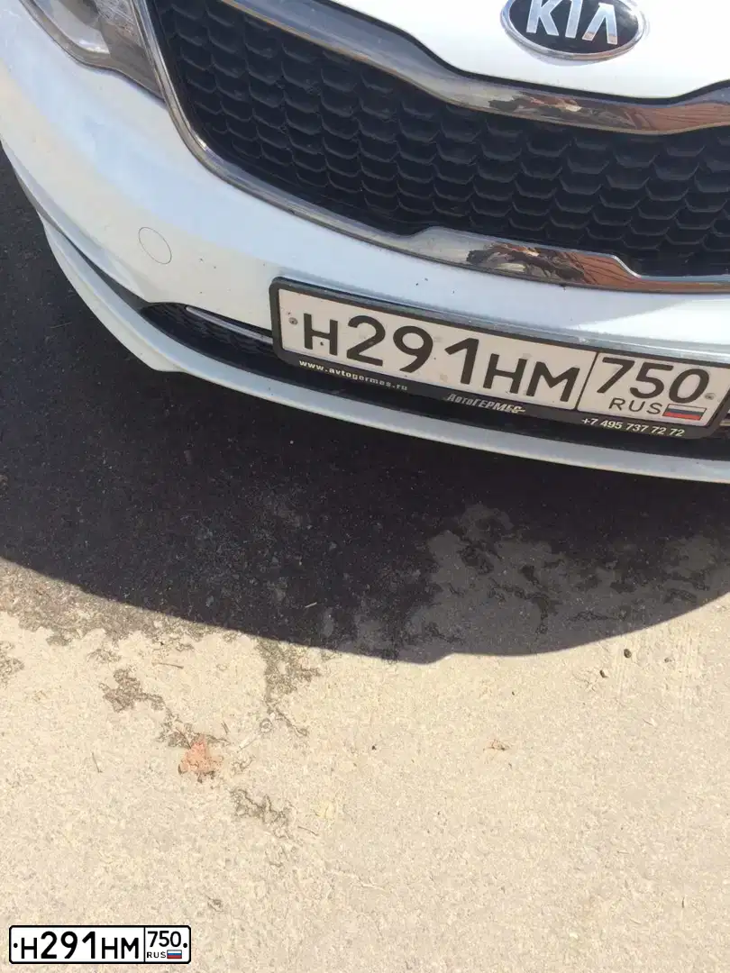 Фото автомобиля KIA RIO, 2016 — госномер Н291НМ750. Цвет: Белый