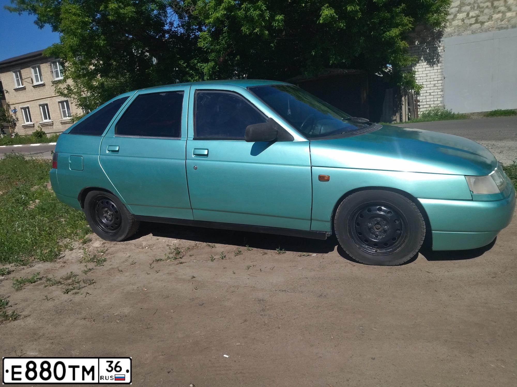 Фото автомобиля LADA 2112, 2002 — госномер Е880ТМ36. Цвет: СЕРЕБРИСТО-СЕРО-ЗЕЛЕНЫЙ