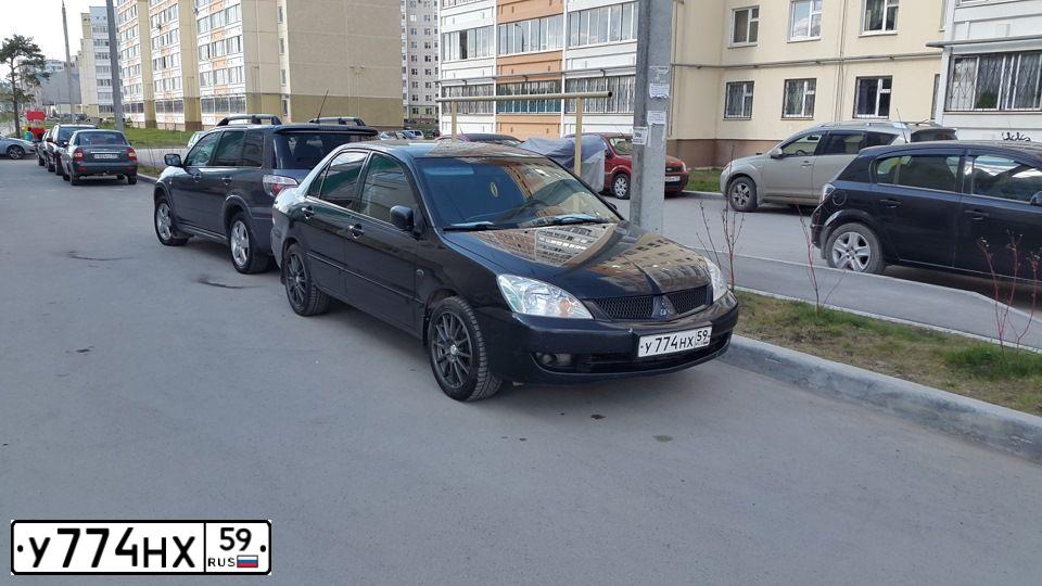 Фото автомобиля MITSUBISHI LANCER, 2006 — госномер С429РС196. Цвет: ЧЕРНЫЙ