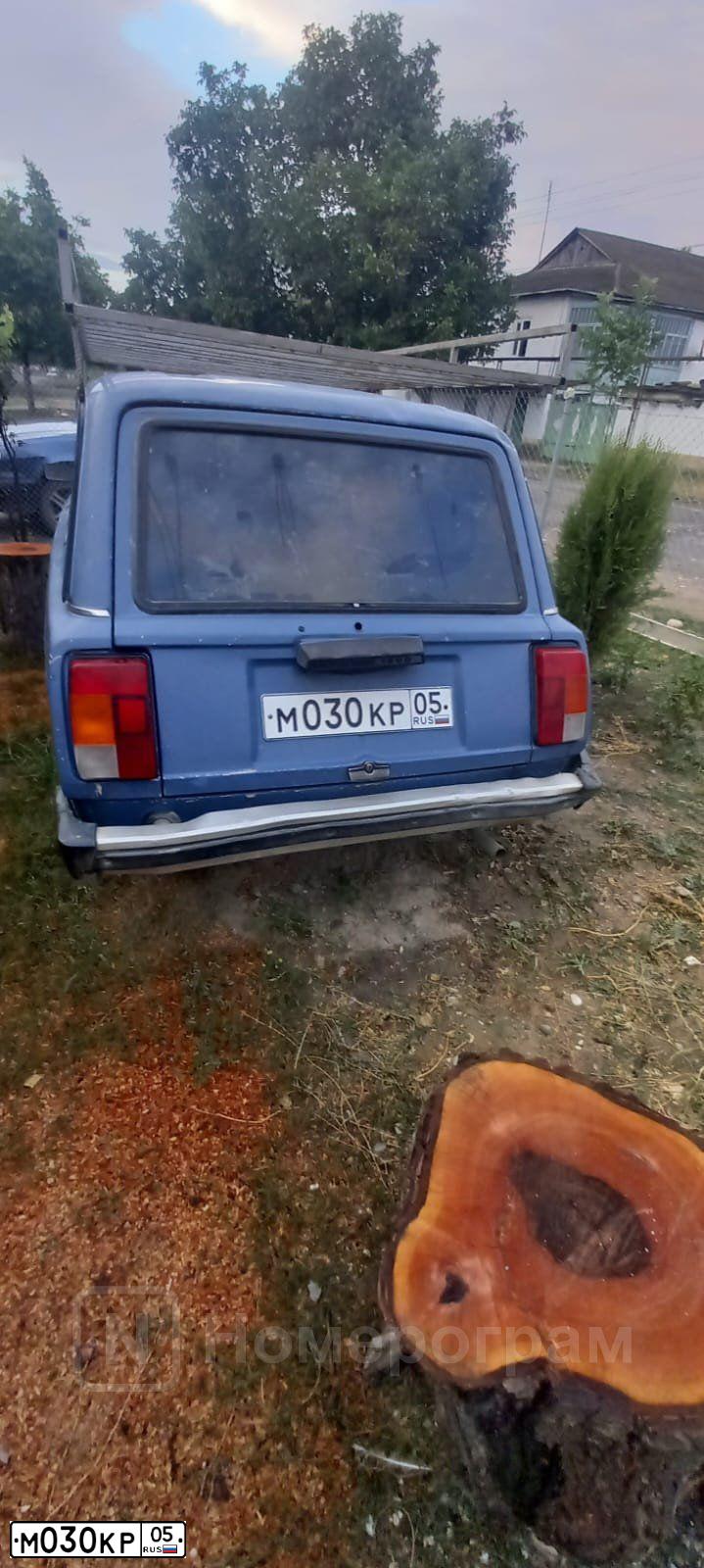 Фото автомобиля LADA 2104, 2003 — госномер М030КР05. Цвет: СИНИЙ