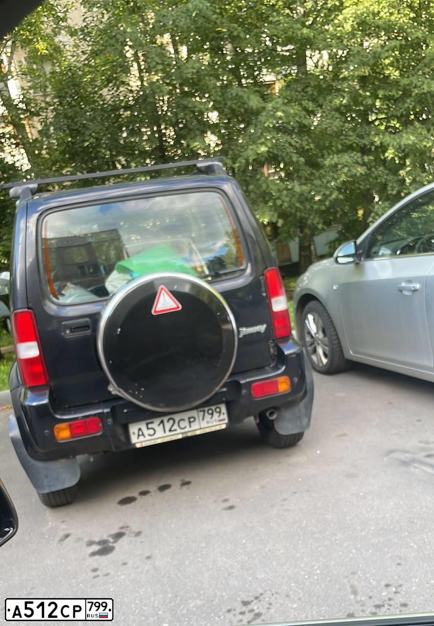 Фото автомобиля SUZUKI JIMNY, 2007 — госномер А512СР799. Цвет: ЧЕРНЫЙ