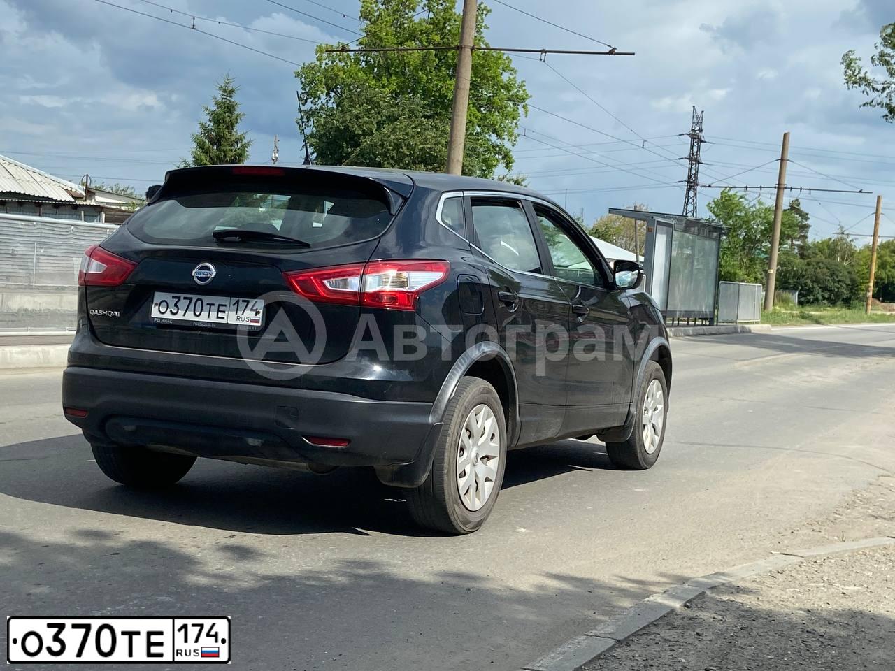 Фото автомобиля NISSAN QASHQAI, 2015 — госномер О370ТЕ174. Цвет: ЧЕРНЫЙ